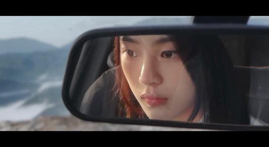 Director Shin Woo Seok explains his intent + the story behind NewJeans' 'ETA' MV